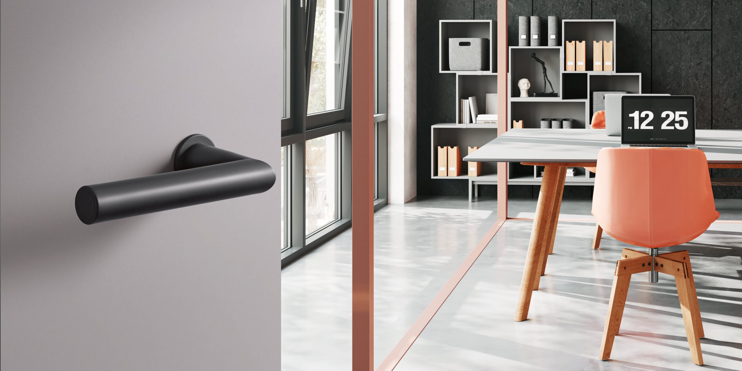 A black synthetic material door handle on a grey door; behind it, an office with a desk and chair in front of a dark grey wall