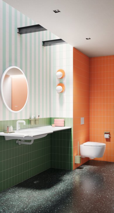 Offenes Bad neben einem Schlafzimmer mit Waschtisch, WC und Duschbereich mit grüner Ausstattung vor orangefarbenen Fliesen