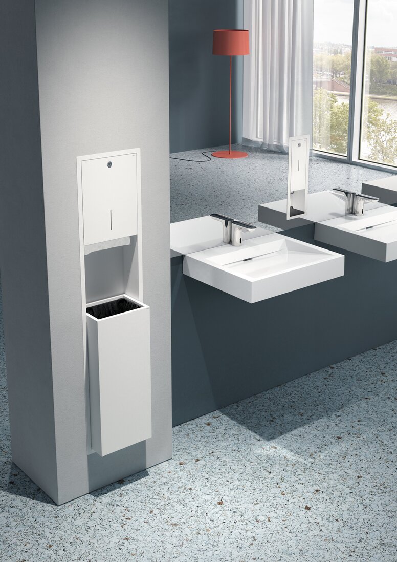 HEWI System 900 Concealed Fitting White powder-coated paper towel dispenser with integrated waste bin for wall mounting in public WCs