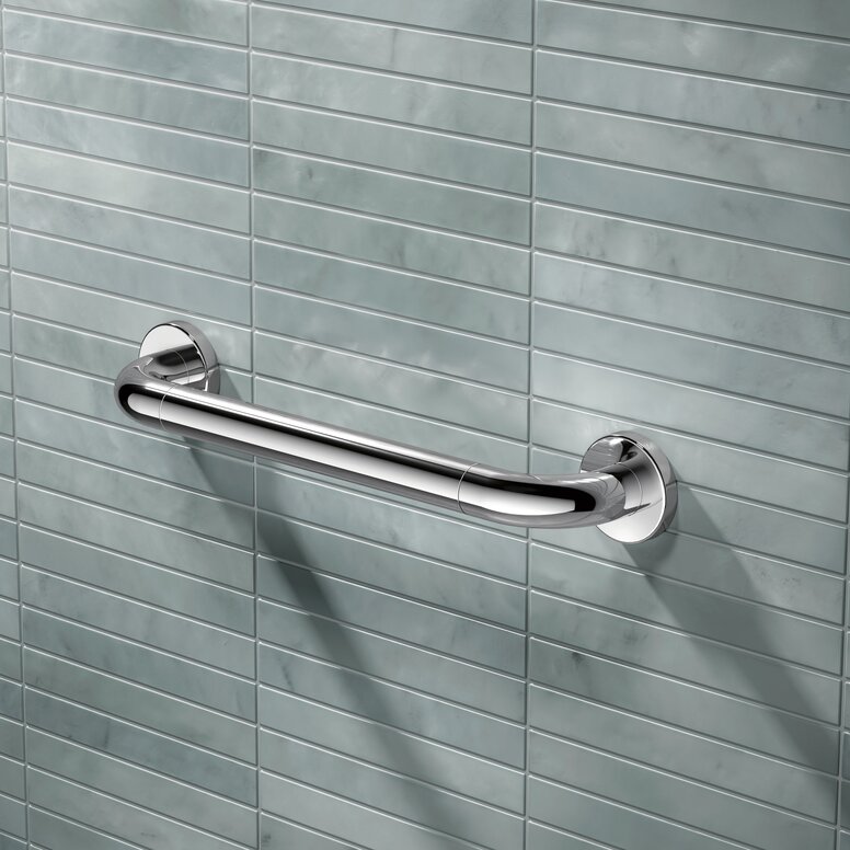 Chrome-plated support rail fitted to a light blue tiled wall