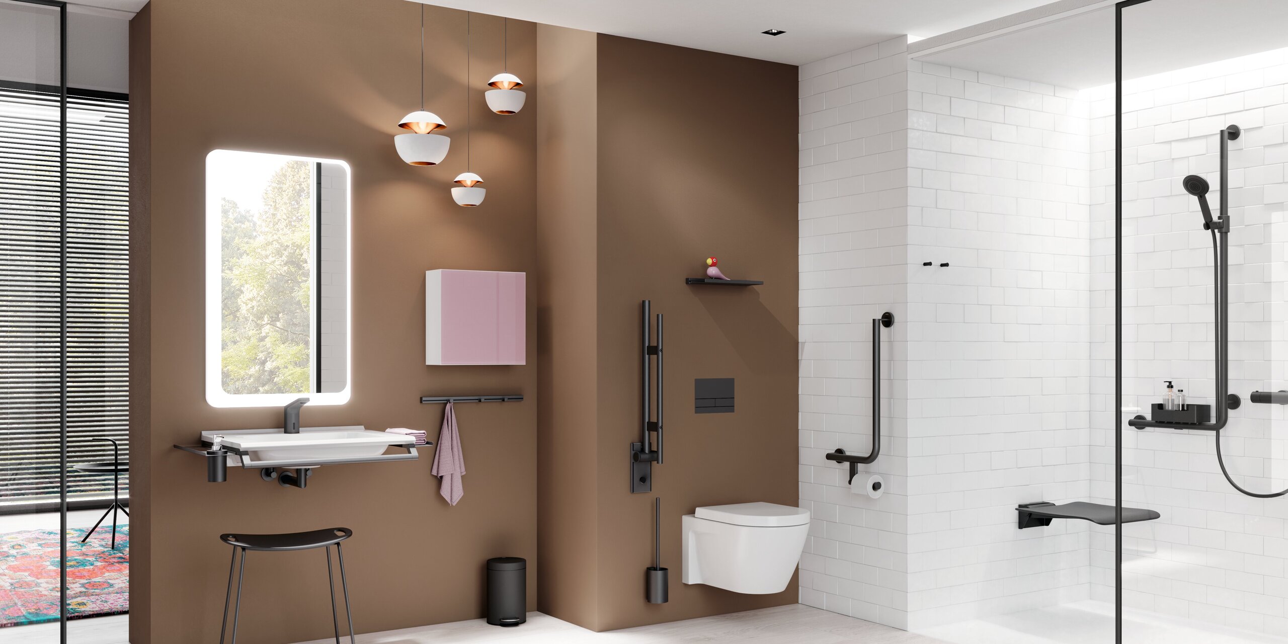 Modern bathroom with a wall-hung toilet against a brown feature wall, a washbasin with an illuminated mirror and stool on the left, and a level-access shower with a glass partition and dark grab rails on the right